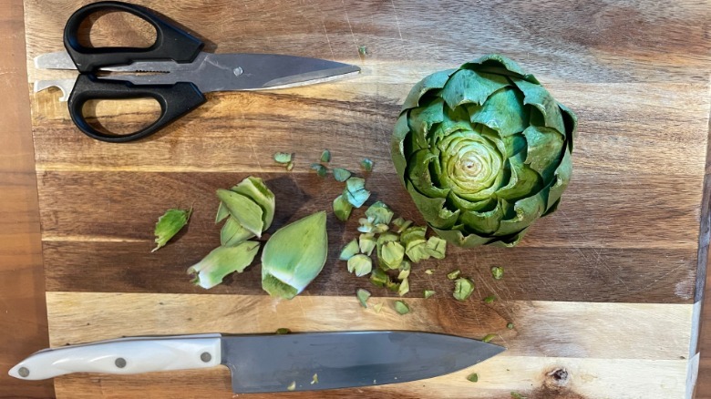 Artichoke points and tough leaves removed