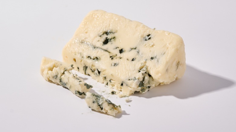 Crumbled blue cheese on a table