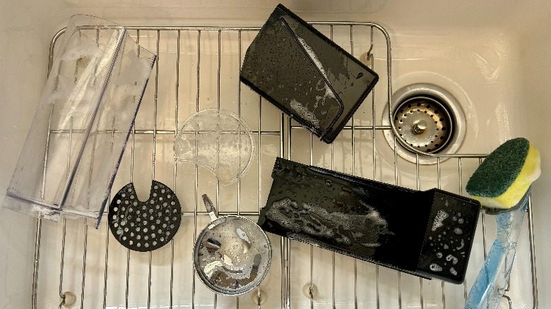 Nespresso parts in sink