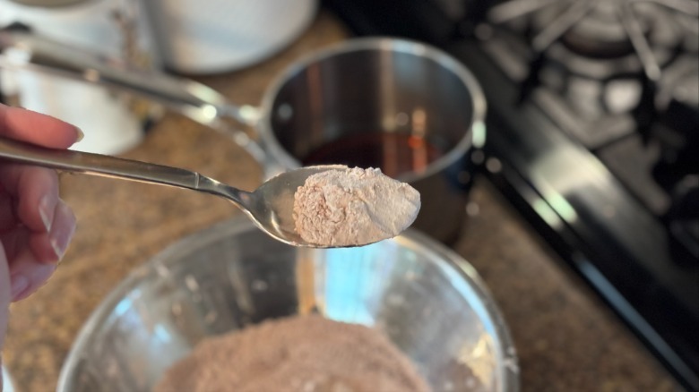 adding dry ingredients to simple syrup for boba pearls