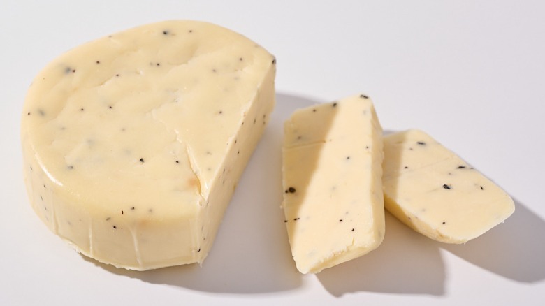 Sliced cheddar cheese on a table