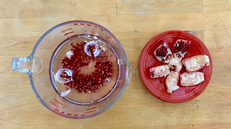 pomegranates in water
