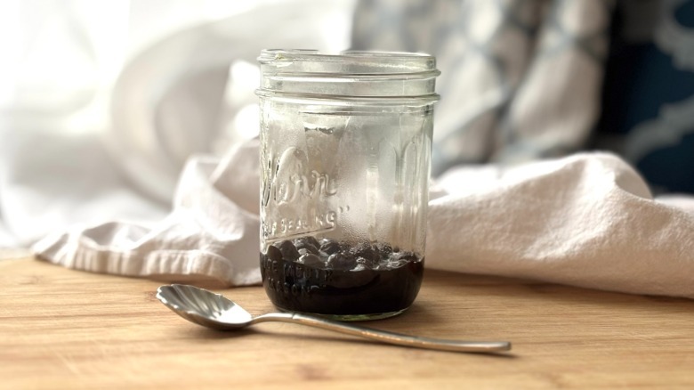 cooked boba pearls and syrup in glass