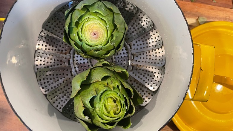 Artichokes in steamer basket