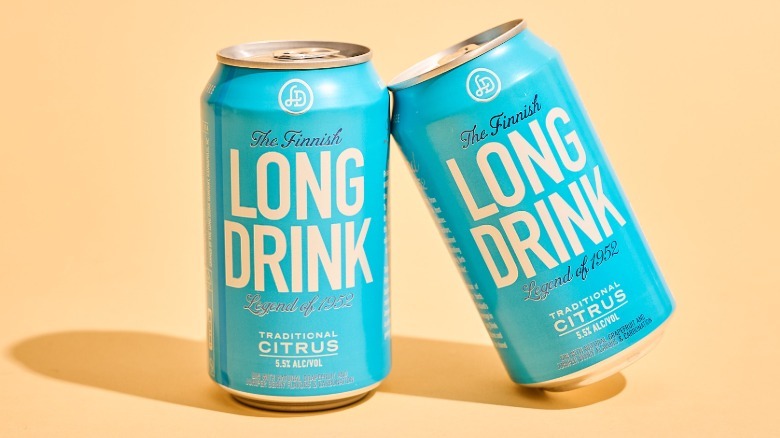 two long drink cans on a table