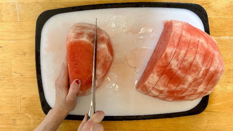 Watermelon being sliced