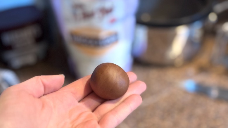 one-inch boba dough ball sitting on hand