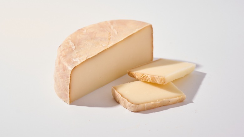 Sliced mini basque cheese on a table