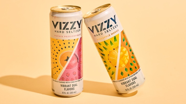 Two vizzy cans on a table