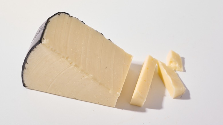 Sliced cheddar on a table