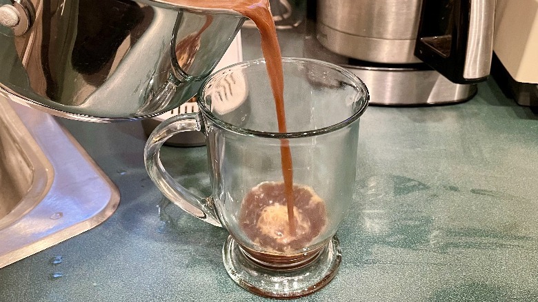 Coffee poured into a mug