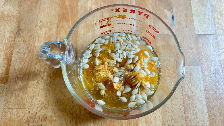 Bowl filled with pumpkin seeds